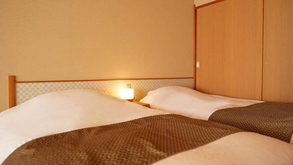 Tsukino Sumika Atami Juraku Hotel Exteriör bild